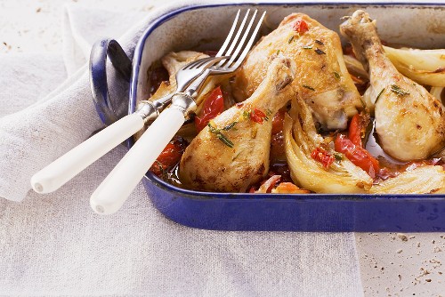 Chicken legs on a fennel and tomato medley
