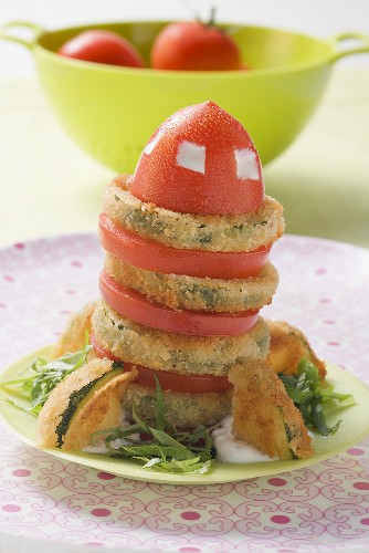 Breaded courgette slices with tomato salad