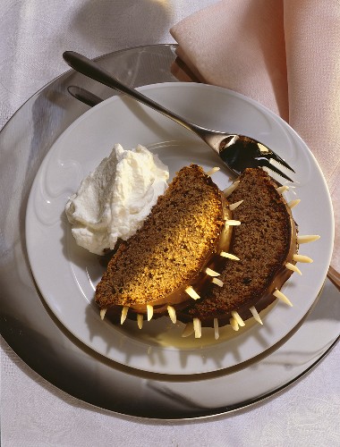 Two pieces of Rehrücken cake (chocolate cake with almonds)