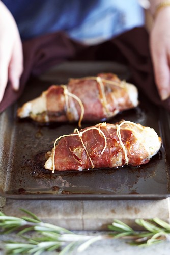 Chicken breasts stuffed with mushroom and herbs and wrapped in bacon