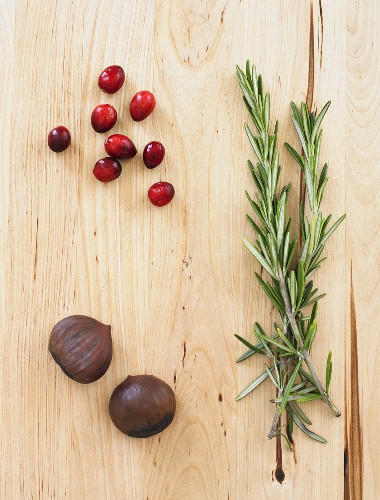 Chestnuts, Cranberries and Rosemary on Wood