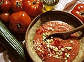 A Bowl of Gazpacho Soup with Ingredients