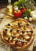 Pizza with olives and artichokes