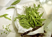 Fresh pea pods and peas