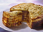 Layered pancakes with cabbage