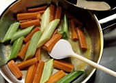 Stewed Carrots and Leeks in a Pan