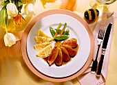 Sliced Duckling Breast with Crepes and Vegetables on Orange Sauce