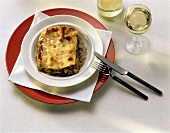 A Serving of Lasagne with White Wine