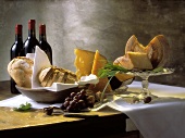 Assorted Types of Cheese with Bread; Red Wine
