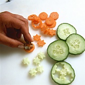 Cutting out carrot and cucumber stars