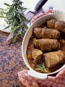 Rolled Slices of Beef in White Oval Dish