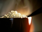 Steaming White Rice in a Bowl
