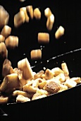 Tossing Croutons in a Frying Pan