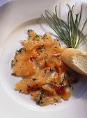 Marinated salmon with slice of French bread