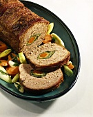 Meatloaf with carrot and leek centre, slices cut