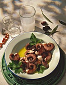 Pickled Squid (Polyp) on Plate with fresh leaf Parsley