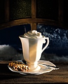 A Cup of Hot Chocolate with Whipped Cream and Cookies