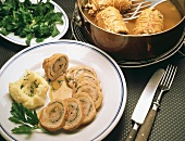 Sliced chard stuffed veal roulades