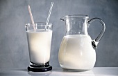 A Glass of Milk with Two Straws; Pitcher of Milk