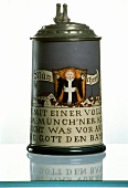 Tankard with "Munich child" motif in stoneware from 1909