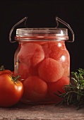 Tomatoes in a preserving jar