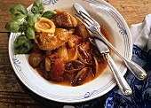 Osso buco with tomatoes and plums