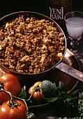 Turkish mince and bulgur dish with tomatoes and cheese