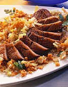 Duck breast with red lentils, leeks and carrots