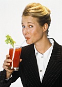 Woman Sipping a Bloody Mary