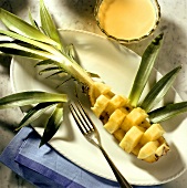 Chunks of fresh pineapple decoratively carved