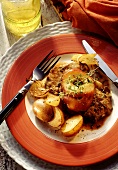 Pork cooked in apple cider with potatoes