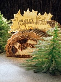 Black Forest style Buche de Noel with sugar fir trees and snow
