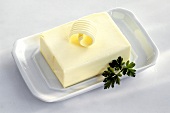 Butter on a Butter Dish with a Butter Curl