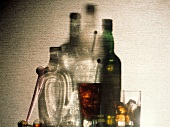 Still Life with Spirits in Glasses Beside a Wall with Shadows