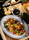 Sweet & sour vegetables & shiitake mushrooms on Chinese plate