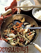 Stir Fry Vegetables in a Wok with Pork