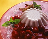 Panna cotta e ciliege (Cream dessert with cherry sauce, Italy)