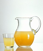 Sauerkraut juice in glass and carafe