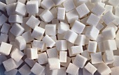 Lots of sugar cubes (close-up)