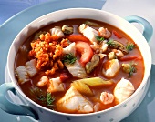 Fish and tomato stew with seafood and vegetables