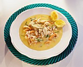 Mushroom ragout in deep plate with two pieces of polenta