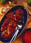 Oven grilled chicken wings with spicy sauce