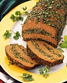 Meatloaf with parsley, cut into