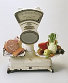 A Scale Weighing Healthy Food Against Unhealthy Food