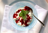 Vanilla Rice Pudding with Raspberry Sauce and Fresh Mint