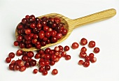 A Wooden Scoop Full of Cranberries