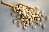 White Beans in a Wooden Scoop