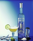 Margarita and a blue bottle of tequila