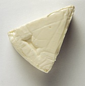 Commercially produced processed cheese triangle