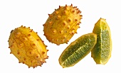 Kiwano: two whole fruits and two slices